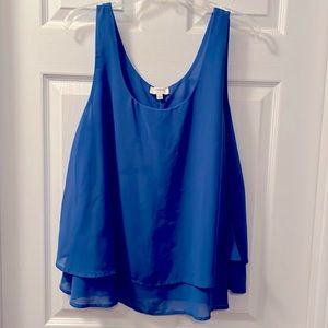 Umgeee royal blue bottom ruffled sleeveless top. Boutique purchased